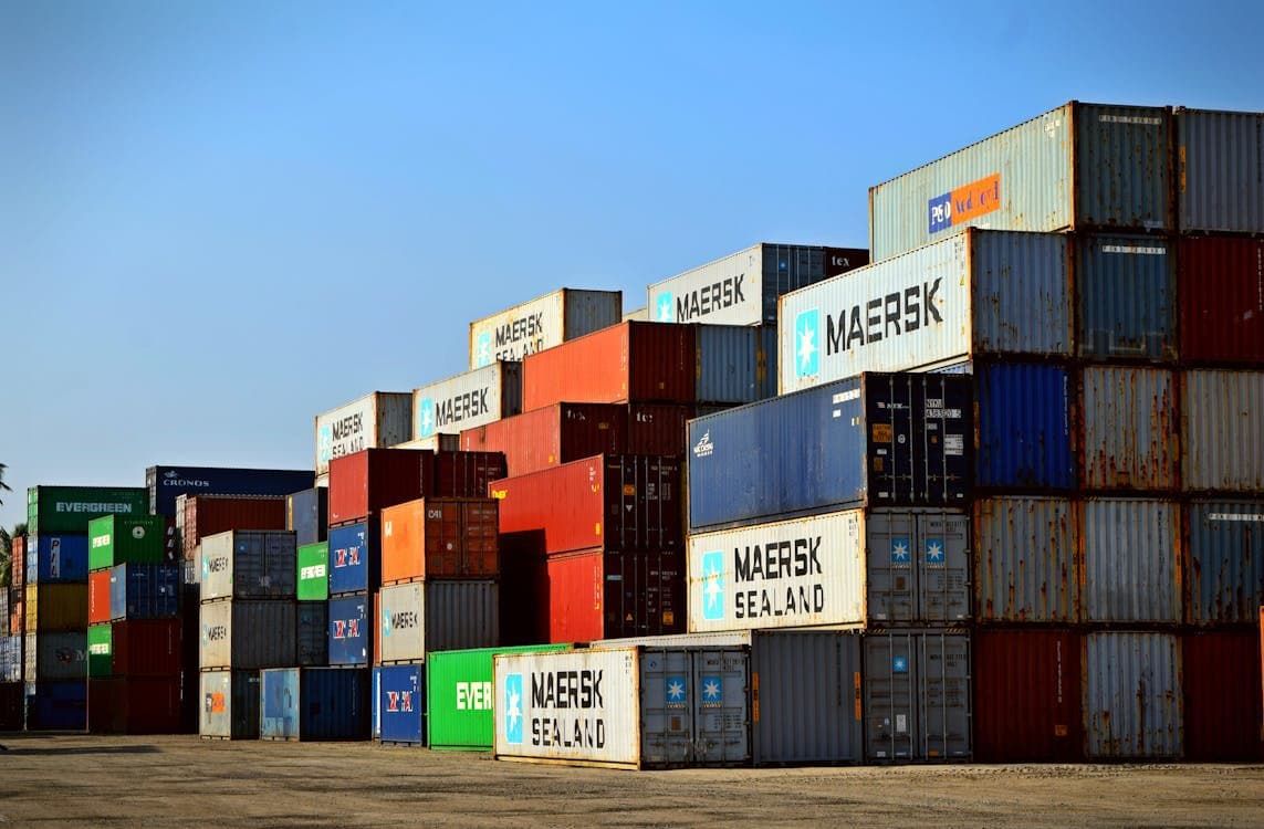 Maersk shipping containers stacked on top of each other